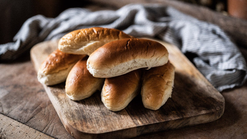 A stack of ultimate finger roll buns.