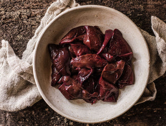 A bowl of raw, grass fed lamb's liver