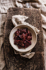 A bowl of raw, grass fed lamb's liver