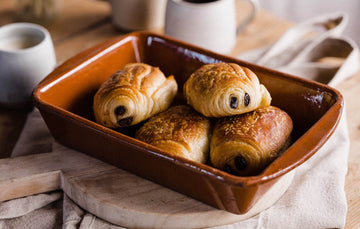 Golden Pain Au Chocolat made Using Traditional French Baking Techniques with Rich Chocolate, Baked From Frozen in 25 Minutes.