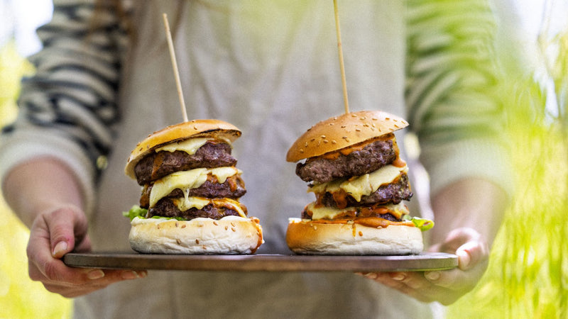 Lamb burgers with cheese, sauce and salad