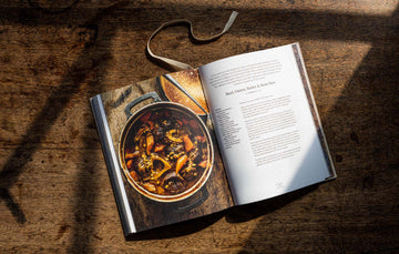 An open copy of the Pipers Farm cookbook
