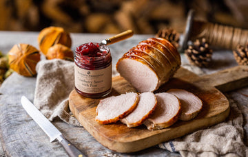 Cooked and sliced free range bronze turkey breast with cranberry sauce