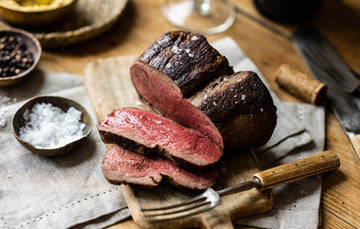 A cooked and sliced Grass Fed Beef Chateaubriand sharing steak.
