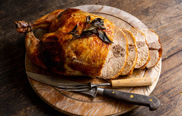 A cooked and sliced properly free range sage & onion stuffed chicken