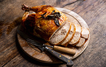 A cooked and sliced properly free range sage & onion stuffed chicken