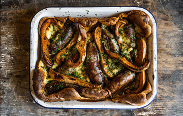 Baked Toad In The Hole With Natural, Native Breed Pork Cumberland Sausages. Comforting Cumberland Sausage Recipe.