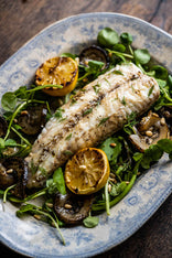 Fire Cooked Monkfish Tail with Garden Herbs, Courgettes & Watercress.
