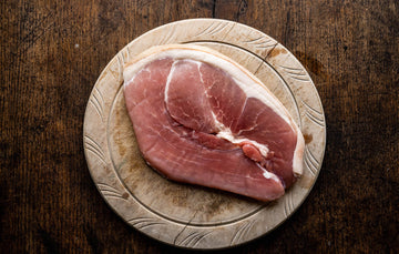 A raw native breed smoked gammon pork steak.