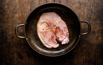 A cooked native breed unsmoked gammon pork steak.