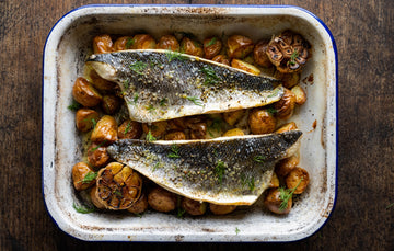 Roast Wild Sea Bass with New Potatoes & Garlic.