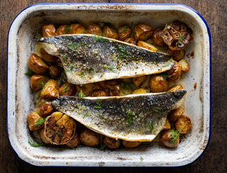 Roast Wild Sea Bass with New Potatoes & Garlic.