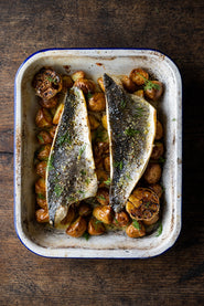 Roast Wild Sea Bass with New Potatoes & Garlic.