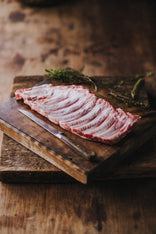 A raw rack of native breed pork ribs