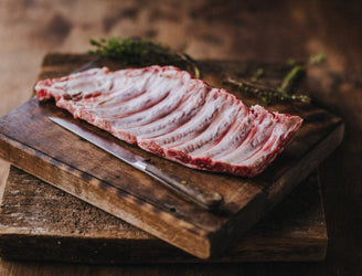 A raw rack of native breed pork ribs