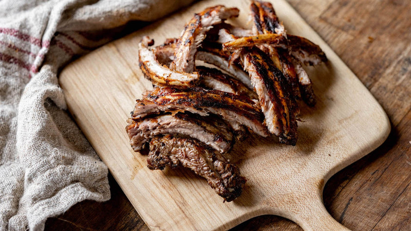 A cooked and sliced rack of native breed pork ribs