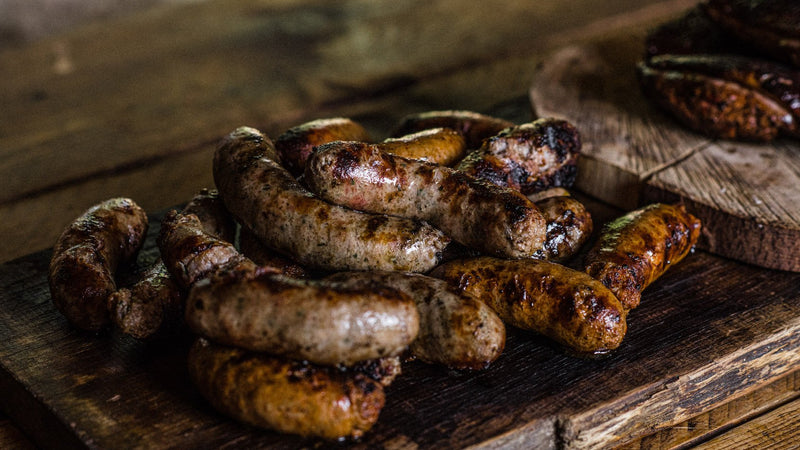 Cooked plain pork native breed pork sausages.