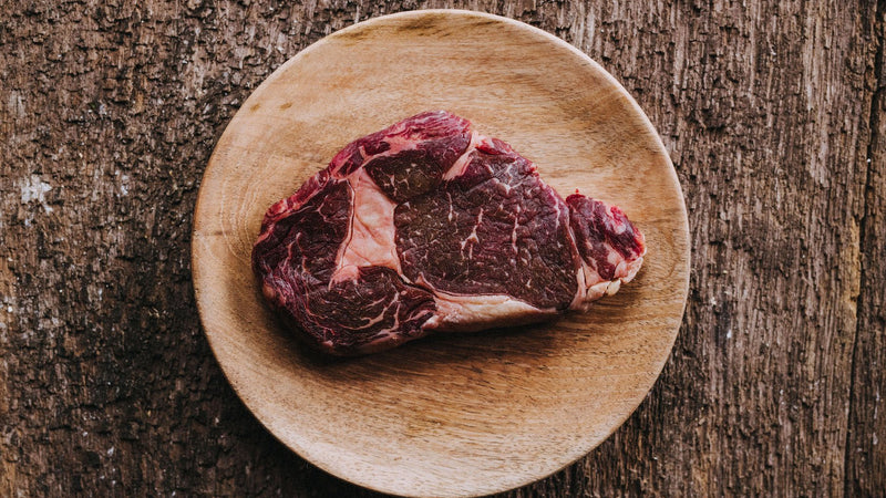 Raw Ribeye Steak from Grass Fed Beef, Perfect for BBQ or Pan-Searing.
