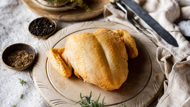 A raw, properly free range spatchcock chicken breast 