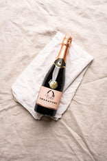 A bottle of Swanaford Brut Rosé sparkling pink wine.