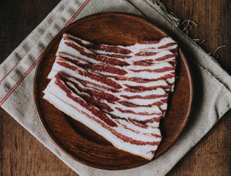 Traditionally Cured Unsmoked Streaky Bacon From Native Breed Pork, Perfect For Weekend Breakfasts.