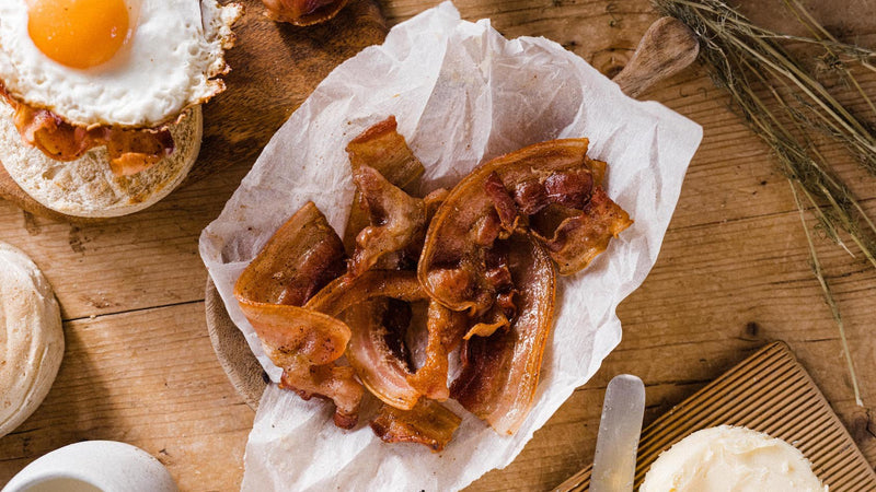 Crispy Unsmoked Streaky Bacon With Fried Eggs, and English Muffins and Raw Cultured Butter.