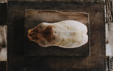 A whole, raw properly free range duck