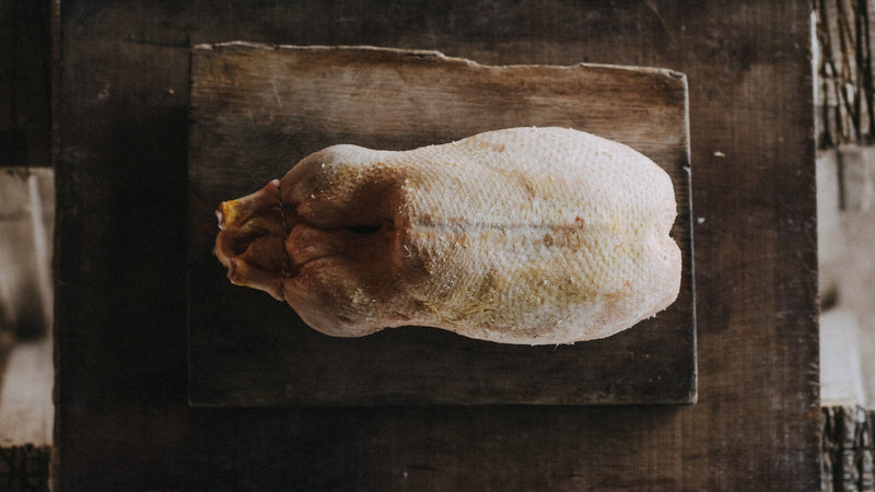 A whole, raw properly free range duck